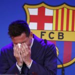 
              Lionel Messi cries at the start of a press conference at the Camp Nou stadium in Barcelona, Spain, Sunday, Aug. 8, 2021. FC Barcelona had previously announced the negotiations with Lionel Messi had ended and that Messi would be leaving the club. (AP Photo/Joan Monfort)
            