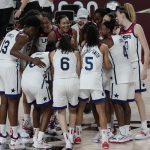 United States players celebrate their win in the women's basketball gold medal game against Japan at the 2020 Summer Olympics, Sunday, Aug. 8, 2021, in Saitama, Japan. (AP Photo/Luca Bruno)