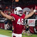 Arizona Cardinals tight end Ross Travis (48) celebrates his touchdown pass against the Kansas City Chiefs during the second half of an NFL football game, Friday, Aug. 20, 2021, in Glendale, Ariz. (AP Photo/Ross D. Franklin)
