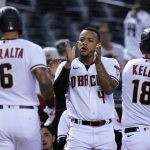 Arizona Diamondbacks' David Peralta (6) celebrates his two-run home run against the San Diego Padres with Ketel Marte (4) and Carson Kelly (18) during the third inning of a baseball game Thursday, Aug. 12, 2021, in Phoenix. (AP Photo/Ross D. Franklin)
