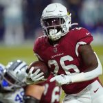 Arizona Cardinals running back Eno Benjamin (26) runs for a touchdown against the Dallas Cowboys during the first half of an NFL preseason football game, Friday, Aug. 13, 2021, in Glendale, Ariz. (AP Photo/Ross D. Franklin)