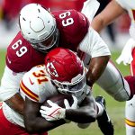 Arizona Cardinals defensive end Josh Mauro (69) tackles Kansas City Chiefs running back Darrel Williams (31) during the first half of an NFL football game, Friday, Aug. 20, 2021, in Glendale, Ariz. (AP Photo/Ross D. Franklin)