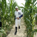 Chicago White Sox pitching coach Ethan Katz walks through cornfield before a baseball game against the New York Yankees, Thursday Aug. 12, 2021, in Dyersville, Iowa. The Yankees and White Sox are playing at a temporary stadium in the middle of a cornfield at the Field of Dreams movie site, the first Major League Baseball game held in Iowa. (AP Photo/Charlie Neibergall)