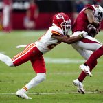 Kansas City Chiefs cornerback Mike Hughes breaks up a pass intended for Arizona Cardinals wide receiver Christian Kirk, right, during the first half of an NFL football game, Friday, Aug. 20, 2021, in Glendale, Ariz. (AP Photo/Ross D. Franklin)