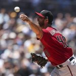 Arizona Diamondbacks starting pitcher Madison Bumgarner delivers to a San Diego Padres batter in the first inning of a baseball game Sunday, Aug. 8, 2021, in San Diego. (AP Photo/Derrick Tuskan)