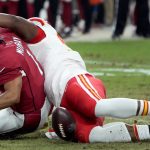 Kansas City Chiefs defensive end Chris Jones forces Arizona Cardinals quarterback Kyler Murray (1) to fumble during the first half of an NFL football game, Friday, Aug. 20, 2021, in Glendale, Ariz. The Cardinals recovered the ball. (AP Photo/Rick Scuteri)