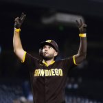 San Diego Padres' Eric Hosmer celebrates his home run against the Arizona Diamondbacks during the seventh inning of a baseball game Monday, Aug. 30, 2021, in Phoenix. (AP Photo/Ross D. Franklin)