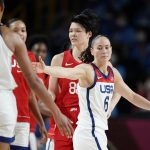 United States' Sue Bird (6), right, celebrates with teammate A'Ja Wilson (9) at the halftime during women's basketball gold medal game against Japan at the 2020 Summer Olympics, Sunday, Aug. 8, 2021, in Saitama, Japan. (AP Photo/Charlie Neibergall)