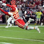 Kansas City Chiefs defensive back Juan Thornhill (22) intercepts a pass in the end zone against the Arizona Cardinals during the first half of an NFL football game, Friday, Aug. 20, 2021, in Glendale, Ariz. (AP Photo/Rick Scuteri)
