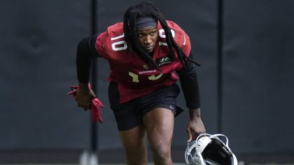 Arizona Cardinals wide receiver DeAndre Hopkins runs to the next drill practice area during NFL foo...