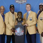 Tony Dungy, left to right, Derrick Brooks, John Lynch and Warren Sapp pose with the bust during the induction ceremony at the Pro Football Hall of Fame, Sunday, Aug. 8, 2021, in Canton, Ohio. (AP Photo/Ron Schwane, Pool)