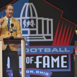 Peyton Manning, a member of the Pro Football Hall of Fame Class of 2021, speaks during the induction ceremony at the Pro Football Hall of Fame, Sunday, Aug. 8, 2021, in Canton, Ohio. (AP Photo/David Richard)