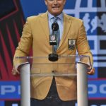 John Lynch, a member of the Pro Football Hall of Fame Class of 2021, speaks during the induction ceremony at the Pro Football Hall of Fame, Sunday, Aug. 8, 2021, in Canton, Ohio. (AP Photo/David Richard)