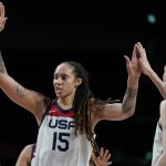 United States' Brittney Griner (15) celebrates with teammates after a foul by Japan during women's basketball gold medal game at the 2020 Summer Olympics, Sunday, Aug. 8, 2021, in Saitama, Japan. (AP Photo/Charlie Neibergall)