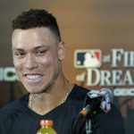 New York Yankees right fielder Aaron Judge speaks during a news conference before a baseball game against the Chicago White Sox, Thursday, Aug. 12, 2021, in Dyersville, Iowa. The Yankees and White Sox are playing at a temporary stadium in the middle of a cornfield at the Field of Dreams movie site, the first Major League Baseball game held in Iowa. (AP Photo/Charlie Neibergall)