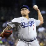 Los Angeles Dodgers pitcher Julio Urias throws against the Arizona Diamondbacks in the first inning during a baseball game, Sunday, Aug 1, 2021, in Phoenix. (AP Photo/Rick Scuteri)