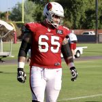 Cardinals OL Brian Winters warms up during practice Thursday, Sept. 23, 2021, in Tempe. (Tyler Drake/Arizona Sports)
