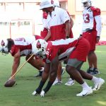 Cardinals DL Leki Fotu (left) and Michael Dogbe (right) go through drills during practice Wednesday, Sept. 15, 2021, in Tempe. (Tyler Drake/Arizona Sports)
