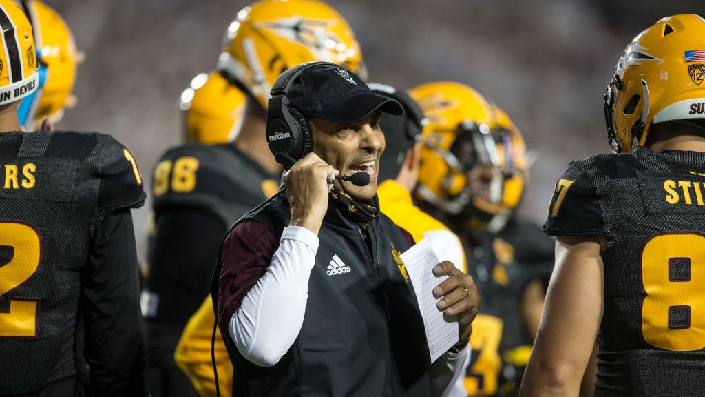Herm Edwards head coach of the Arizona State Sun Devils talks in his headset of the BYU Cougars dur...