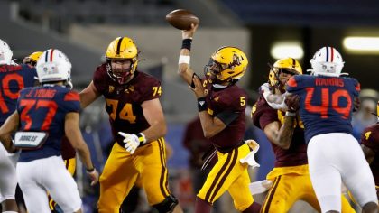 Quarterback Jayden Daniels #5 of the Arizona State Sun Devils throws a pass during the first half o...