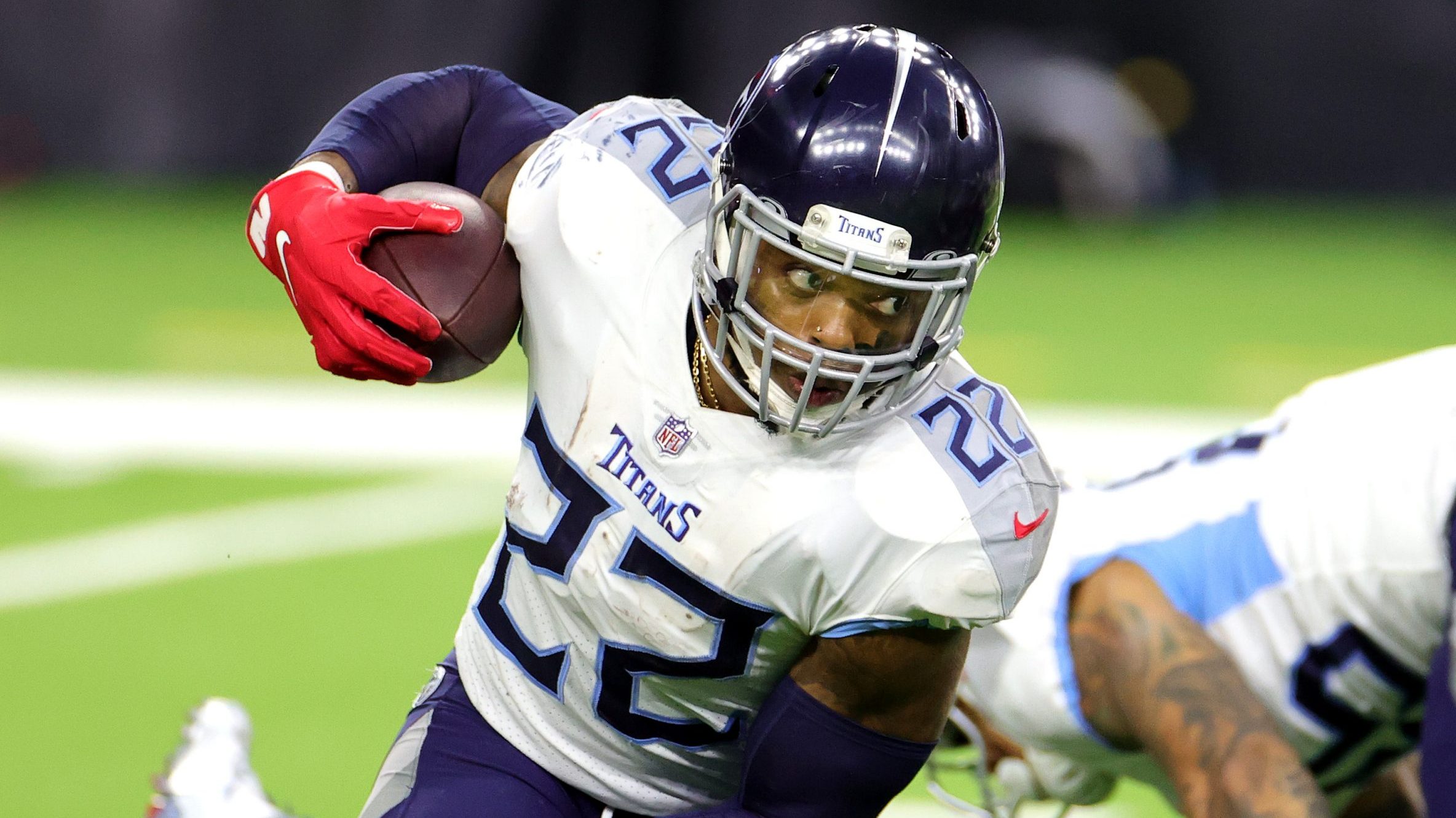 Derrick Henry #22 of the Tennessee Titans in action against the Houston Texans during a game at NRG...