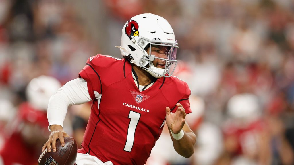 Quarterback Kyler Murray #1 of the Arizona Cardinals scrambles with the football during the first h...