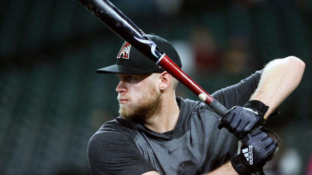 Seth Beer #28 of the Arizona Diamondbacks practices his stance during batting practice before the g...