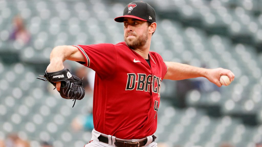 Tyler Gilbert #49 of the Arizona Diamondbacks pitches during the first inning against the Seattle M...