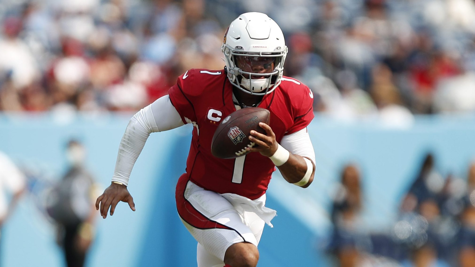 Kyler Murray #1 of the Arizona Cardinals carries the ball during the game against the Tennessee Tit...