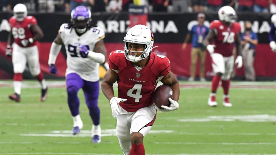 Rondale Moore #4 of the Arizona Cardinals runs with the after the catch for a touchdown against the...