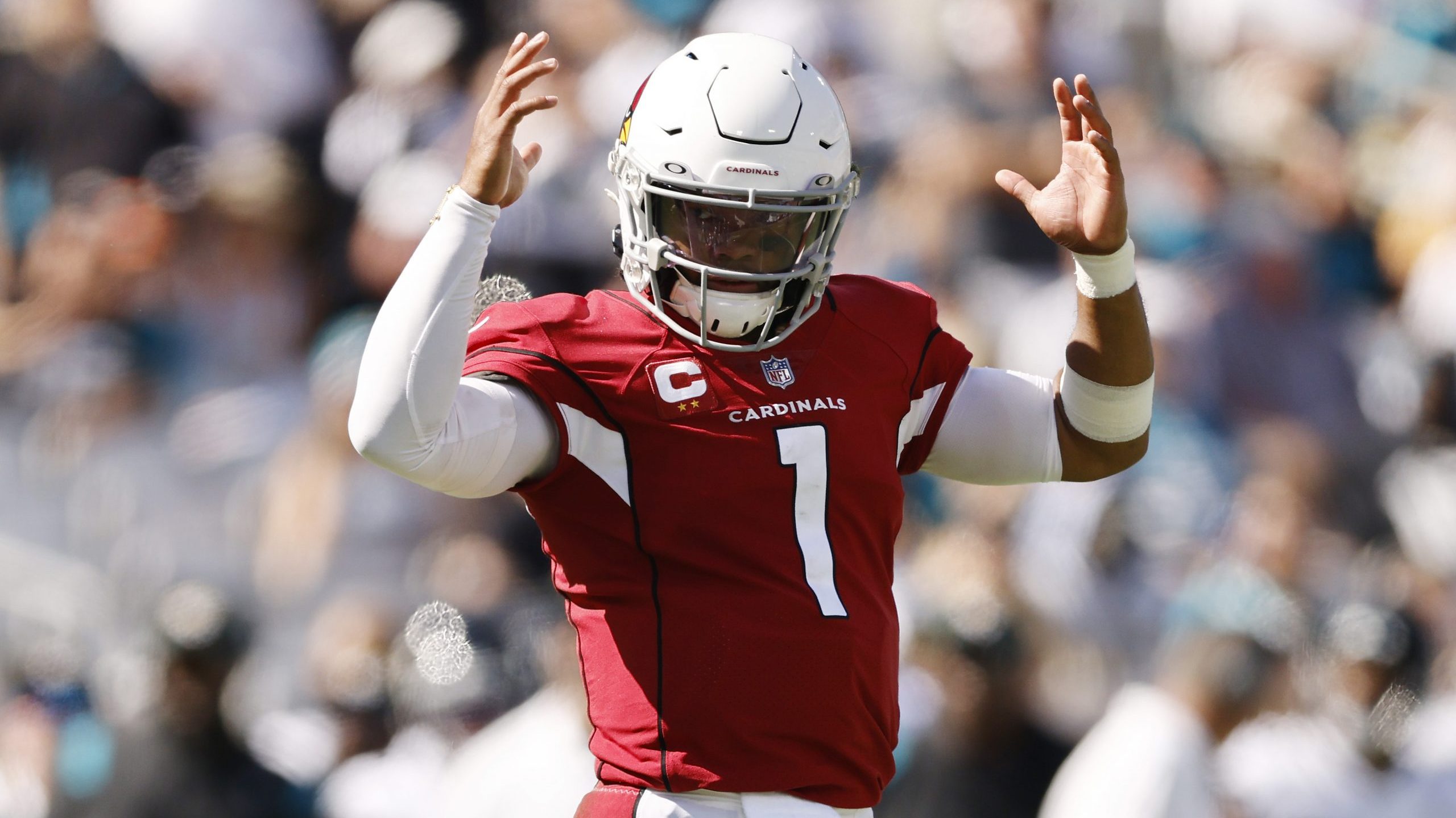 Kyler Murray #1 of the Arizona Cardinals celebrates a rushing touchdown by James Conner #6 (not pic...
