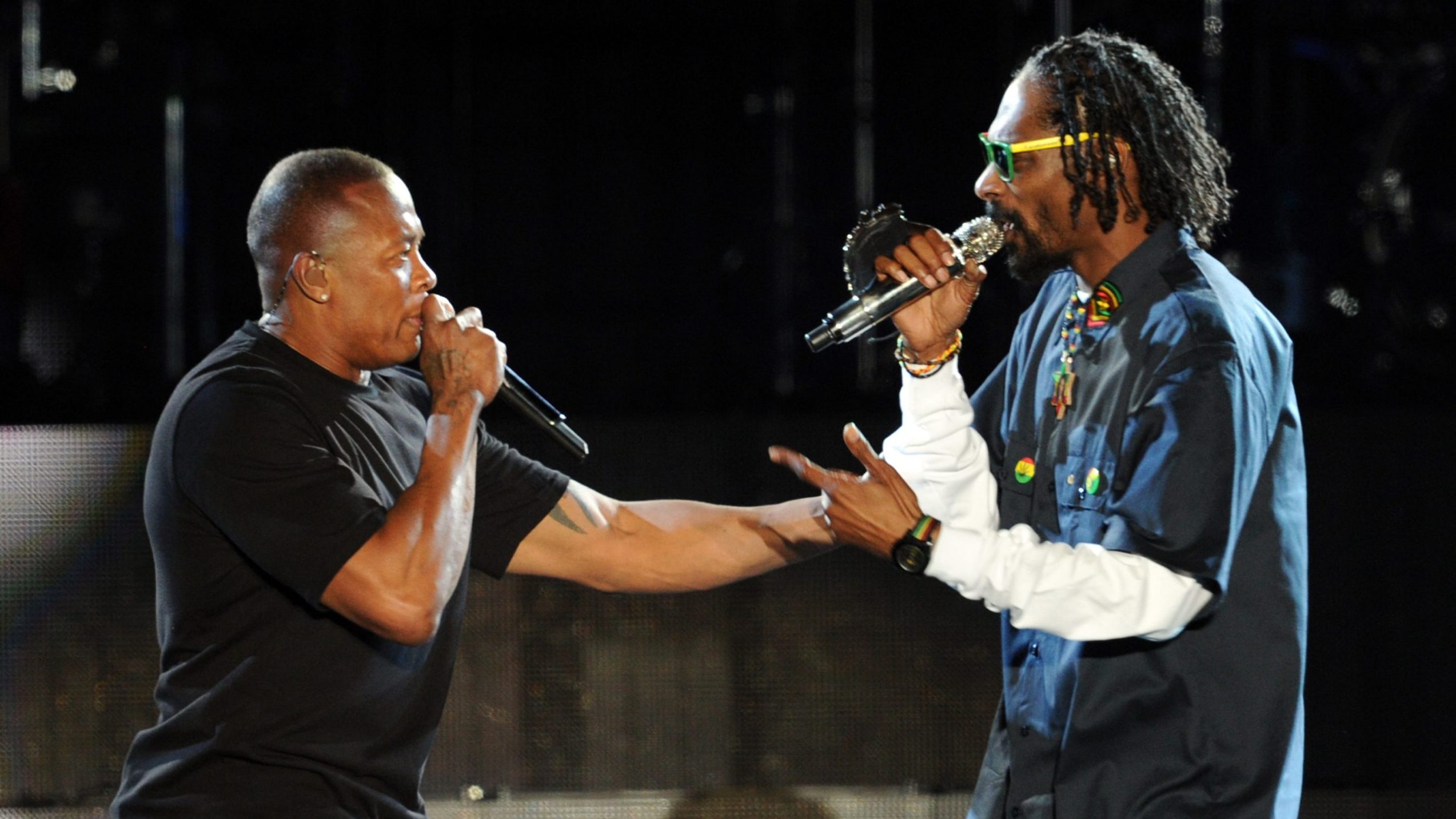 Rappers Dr. Dre (L) and Snoop Dogg perform onstage during day 3 of the 2012 Coachella Valley Music ...