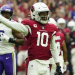 Arizona Cardinals wide receiver DeAndre Hopkins (10) signals first down after his catch against the Minnesota Vikings during the first half of an NFL football game, Sunday, Sept. 19, 2021, in Glendale, Ariz. (AP Photo/Rick Scuteri)