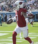 Arizona Cardinals cornerback Byron Murphy (7) celebrates his touchdown against the Jacksonville Jaguars on an intercepted pass during the second half of an NFL football game, Sunday, Sept. 26, 2021, in Jacksonville, Fla. (AP Photo/Phelan M. Ebenhack)