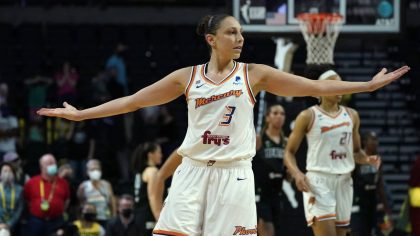 Phoenix Mercury's Diana Taurasi motions after a teammate scored in overtime against the Seattle Sto...