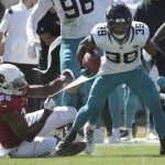 Jacksonville Jaguars wide receiver Jamal Agnew (39) gets away from Arizona Cardinals tight end Demetrius Harris (86) on his way to a 109-yard touchdown run on a missed field goal by the Arizona Cardinals during the first half of an NFL football game, Sunday, Sept. 26, 2021, in Jacksonville, Fla. (AP Photo/Phelan M. Ebenhack)