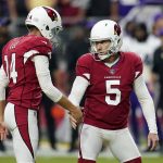 Arizona Cardinals kicker Matt Prater (5) celebrates his go-ahead field goal with punter Andy Lee (14) during the second half of an NFL football game against the Minnesota Vikings, Sunday, Sept. 19, 2021, in Glendale, Ariz. (AP Photo/Ross D. Franklin)