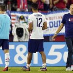 United States head coach Gregg Berhalter, right, leaves the pitch following a 1-1 draw against Canada in a World Cup soccer qualifier Sunday, Sept. 5, 2021, in Nashville, Tenn. (AP Photo/Mark Humphrey)