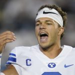 BYU quarterback Jaren Hall shouts to his teammates before the team's NCAA college football game against Arizona State on Saturday, Sept. 18, 2021, in Provo, Ut. (AP Photo/Rick Bowmer)