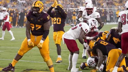 Arizona State defensive lineman Shannon Forman (97) celebrates a defensive stop against Southern Ut...