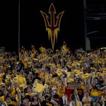 Arizona State fans cheer during the first half of an NCAA college football game against Southern Utah, Thursday, Sept. 2, 2021, in Tempe, Ariz. It was the first game back for fans since the 2019 season. (AP Photo/Matt York)