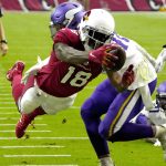 Arizona Cardinals wide receiver A.J. Green (18) dives into the end zone for a touchdown against the Minnesota Vikings during the second half of an NFL football game, Sunday, Sept. 19, 2021, in Glendale, Ariz. (AP Photo/Rick Scuteri)