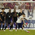 United States forward Christian Pulisic (10) takes a shot that goes over the net during the second half of a World Cup soccer qualifier against Canada Sunday, Sept. 5, 2021, in Nashville, Tenn. (AP Photo/Mark Humphrey)