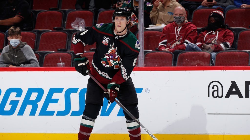 Jakob Chychrun #6 of the Arizona Coyotes looks to pass the puck during the NHL game against the Los...