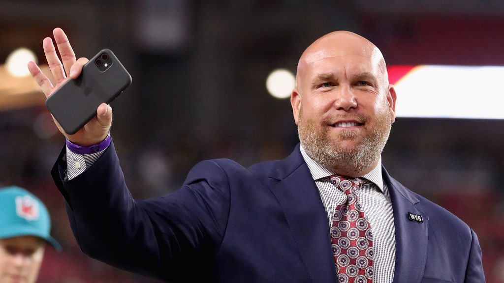 General manager Steve Keim of the Arizona Cardinals waves to fans before the NFL game against the P...