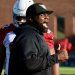 Cardinals DL coach Brentson Buckner coaches up the defensive line during practice Wednesday, Oct. 6, 2021, in Tempe. (Tyler Drake/Arizona Sports)