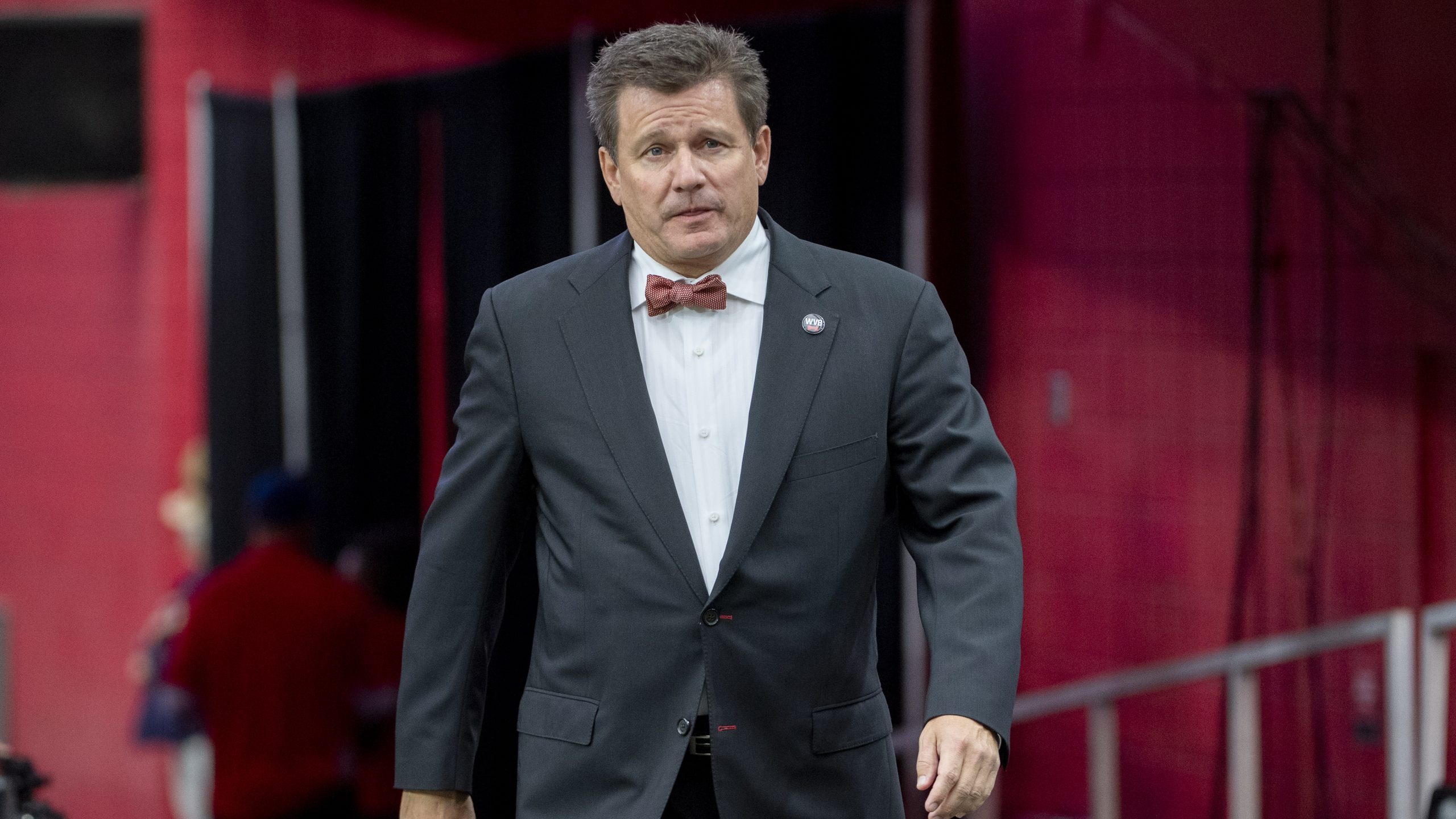 Arizona Cardinals president Michael Bidwill walks onto the field prior to the NFL game between the ...