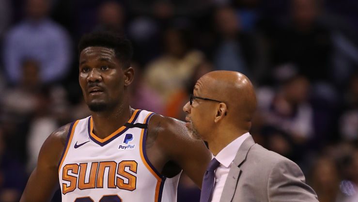 Deandre Ayton #22 of the Phoenix Suns stands with head coach Monty Williams during the second half ...