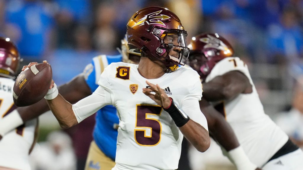 Quarterback Jayden Daniels #5 of the Arizona State Sun Devils passes against the UCLA Bruins in the...