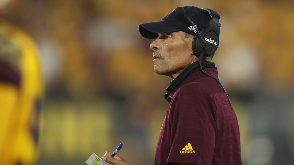 Head coach Herm Edwards of the Arizona State Sun Devils watches from the sidelines during the first...